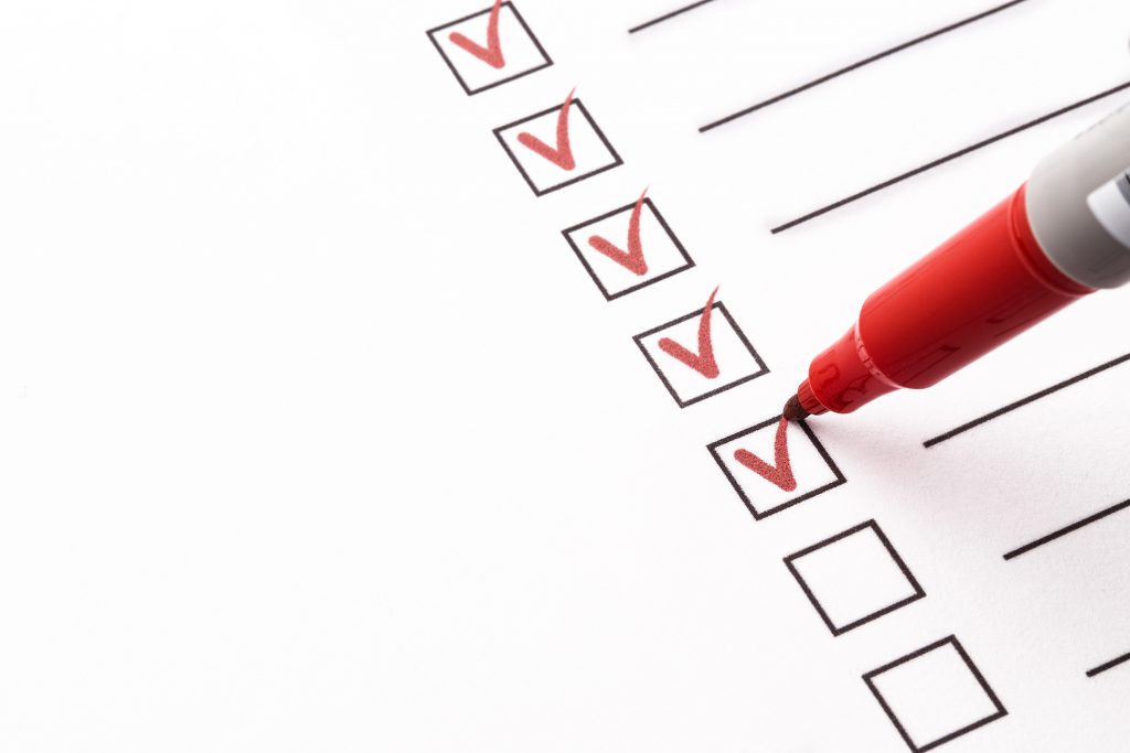 checking off items your moving house checklist